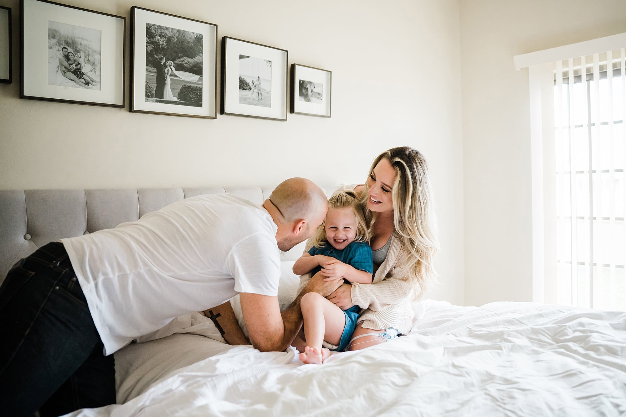 SoCal maternity photographer family on bed