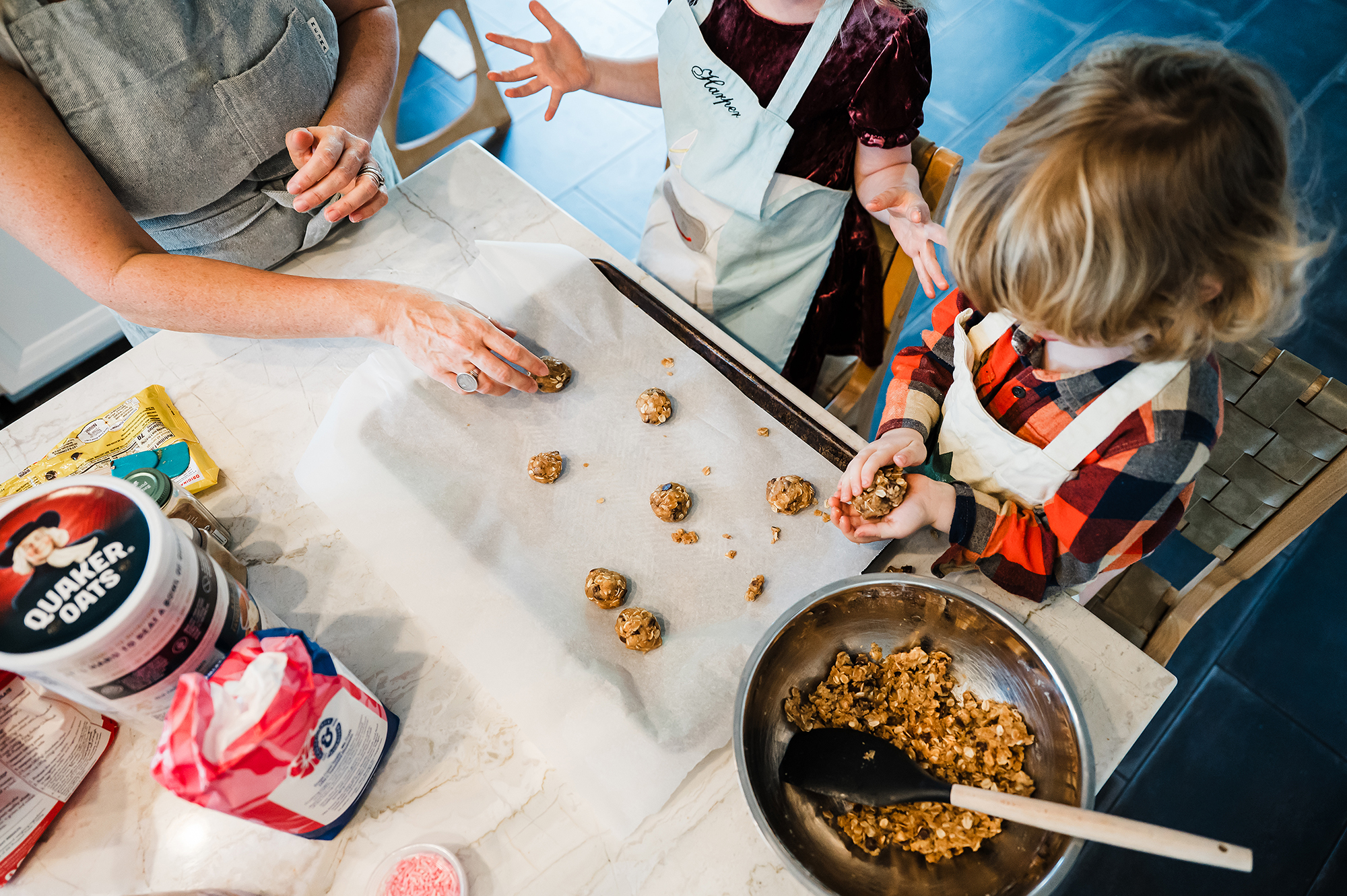 Mom and kids making breakfast together in their San Diego home